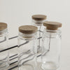 Image of SET X 6 ESPECIEROS VIDRIO Y ACACIA EN RACK 90 ML - 30X4X10 CM