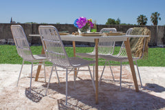 Silla NAIROBI símil rattan en colores blanco, negro y natural, estructura y patas de metal, negras.