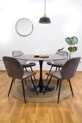 Mesa Tulip redonda tapa de vidrio templado simil marmol negra y pata negra metalica