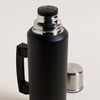 Image of TERMO CAMPING DE ACERO INOXIDABLE NEGRO CON ASA ABATIBLE 1500 ML