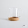 Image of Lechera linea reine de vidrio y base de corcho