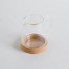 Image of Lechera linea reine de vidrio y base de corcho