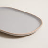 Image of PLATO PLAYO ZARZIS GRIS CON BORDE NATURAL 29X21 CM