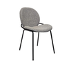 Image of Silla Vila tapizada en tela boucle con patas de hierro negro.