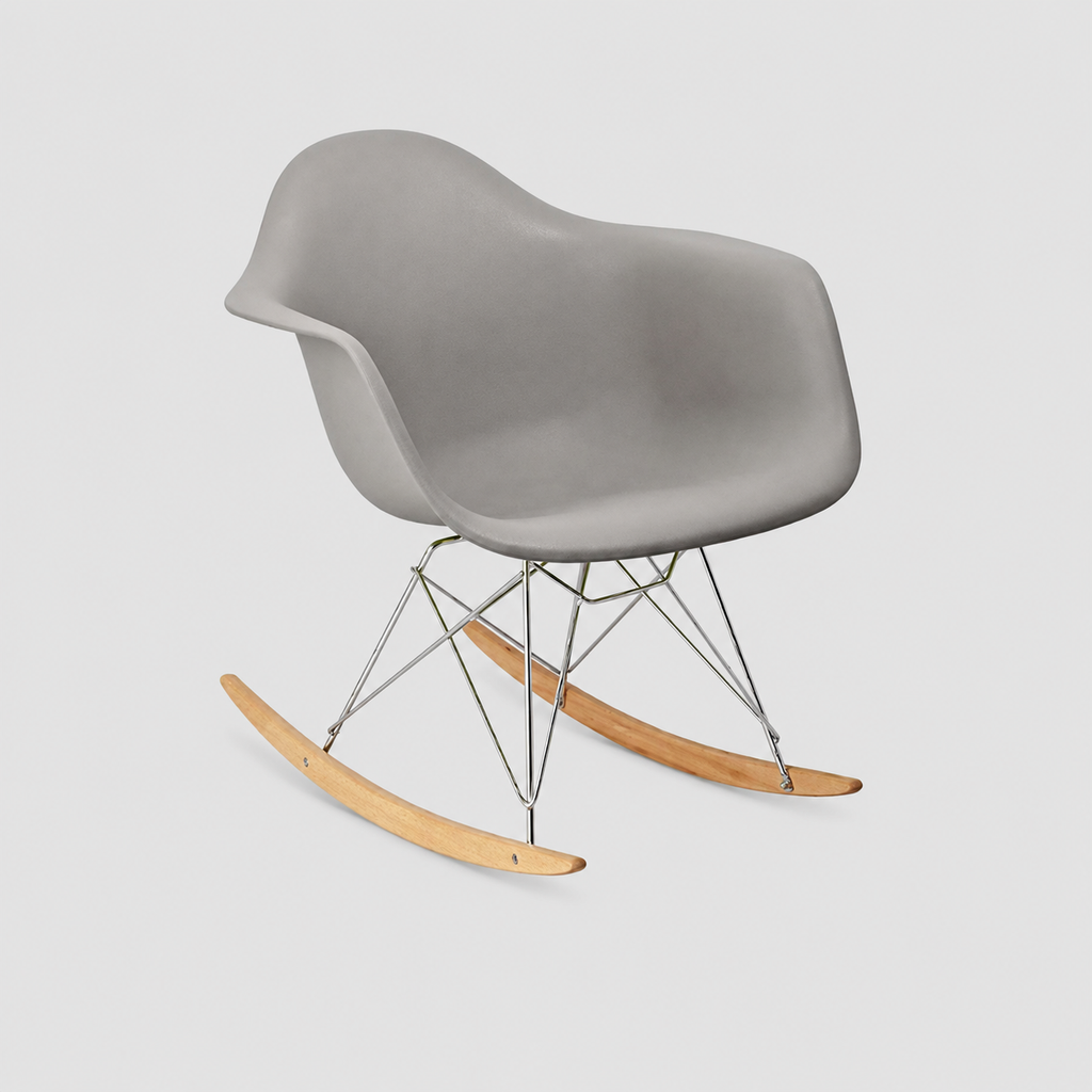 Sillón Eames mecedora de plástico con apoya brazos y patas de madera natural