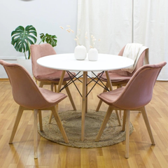 Silla Tulip tapizada en pana rosa con patas de madera