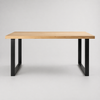 Image of Mesa de comedor de tapa de madera petiribi y patas metálicas.