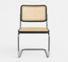 Image of Silla Francesca asiento y respaldo de madera con un esterillado de ratán.