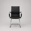 Image of Sillón Aluminium tapizado en ecocuero pata trineo- color negro y blanco