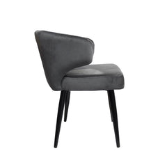Silla Aston con patas metálicas negras y asiento tapizado en pana.