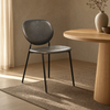 Image of Silla Galway tapizada en tela con patas de hierro negro.