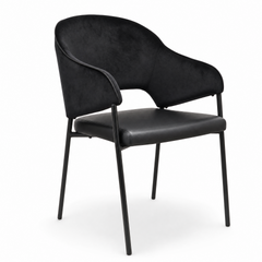 Silla Kate tapizada con patas de hierro negro.