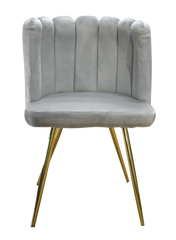 Silla Handy tapizada en pana con asiento y patas de diversos colores.