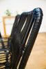 Image of Silla NAIROBI símil rattan en colores negro y natural, estructura y patas de metal, negras.